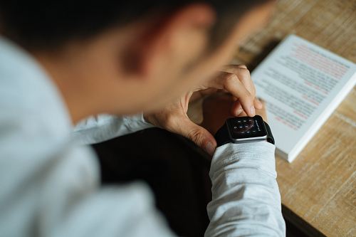 shallow focus photography of smartwatch